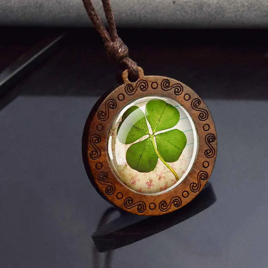 Four leaf clover pressed on aged parchment under glass dome wooden pendant necklace — Pedlar's Attic
