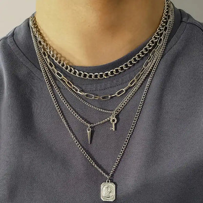 Layered punk chain necklaces with portrait and key pendants, goth spike rivet jewelry