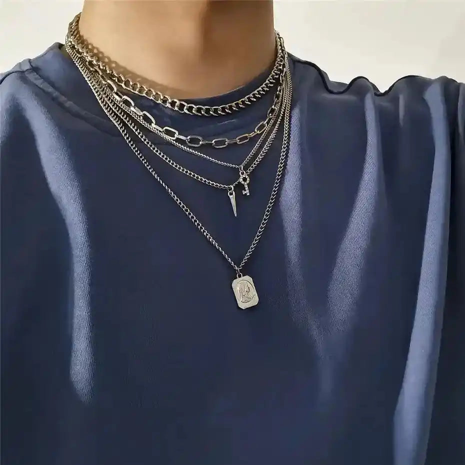 Multiple silver chain necklaces with pendants, layered goth jewelry set
