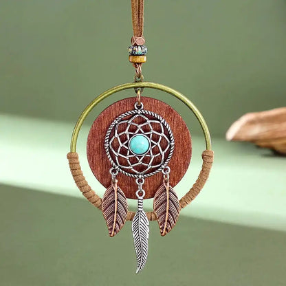 Long bohemian turquoise pendant necklace in dark copper, copper, silver & silver bright. Ethnic-inspired metalwork, lightweight chain. Ships from Pedlar's Attic.