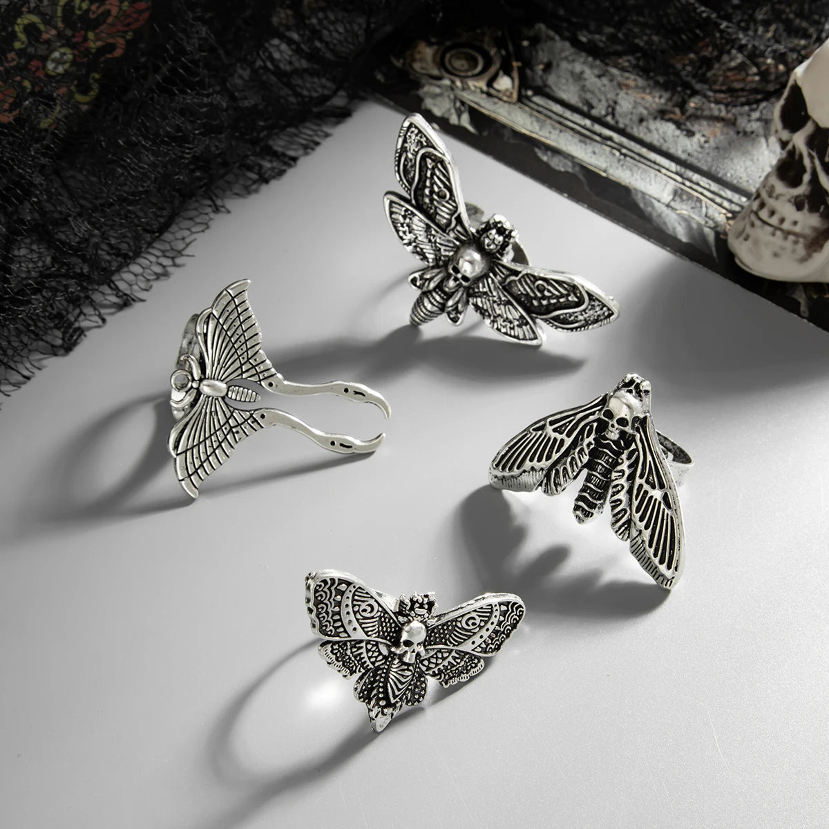 The Duskwing Flight — Four-Piece Gothic Moth Ring Set