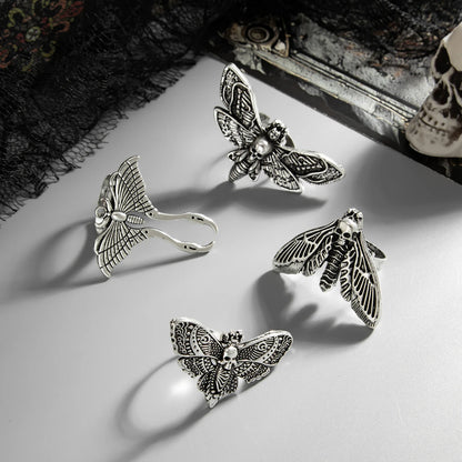 The Duskwing Flight — Four-Piece Gothic Moth Ring Set