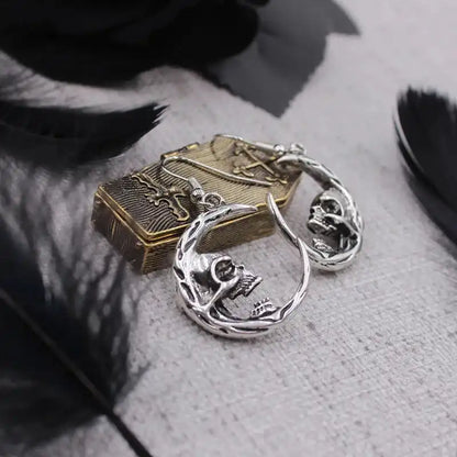 What the Moon Keeps — Skull Dangle Earrings