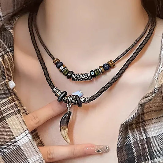 The Wolftooth Braid — Tribal Leather & Dogtooth Pendant Necklace