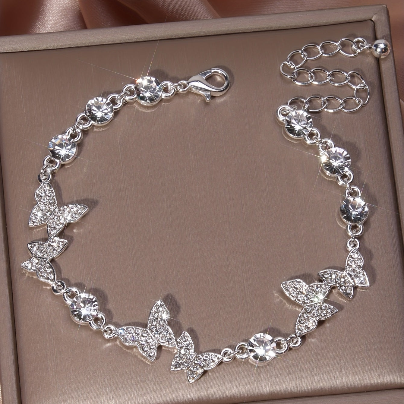 Luxurious Butterfly Shaped Rhinestone Studded Silver Plated Bangle Bracelet - Dazzling Hand Jewelry Gift for Women with Elegant Style - Perfect Accessory for Formal Occasions, Parties, and Daily Wear